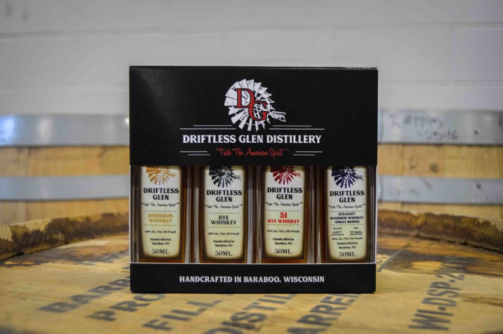 sampler pack with barrels in the background